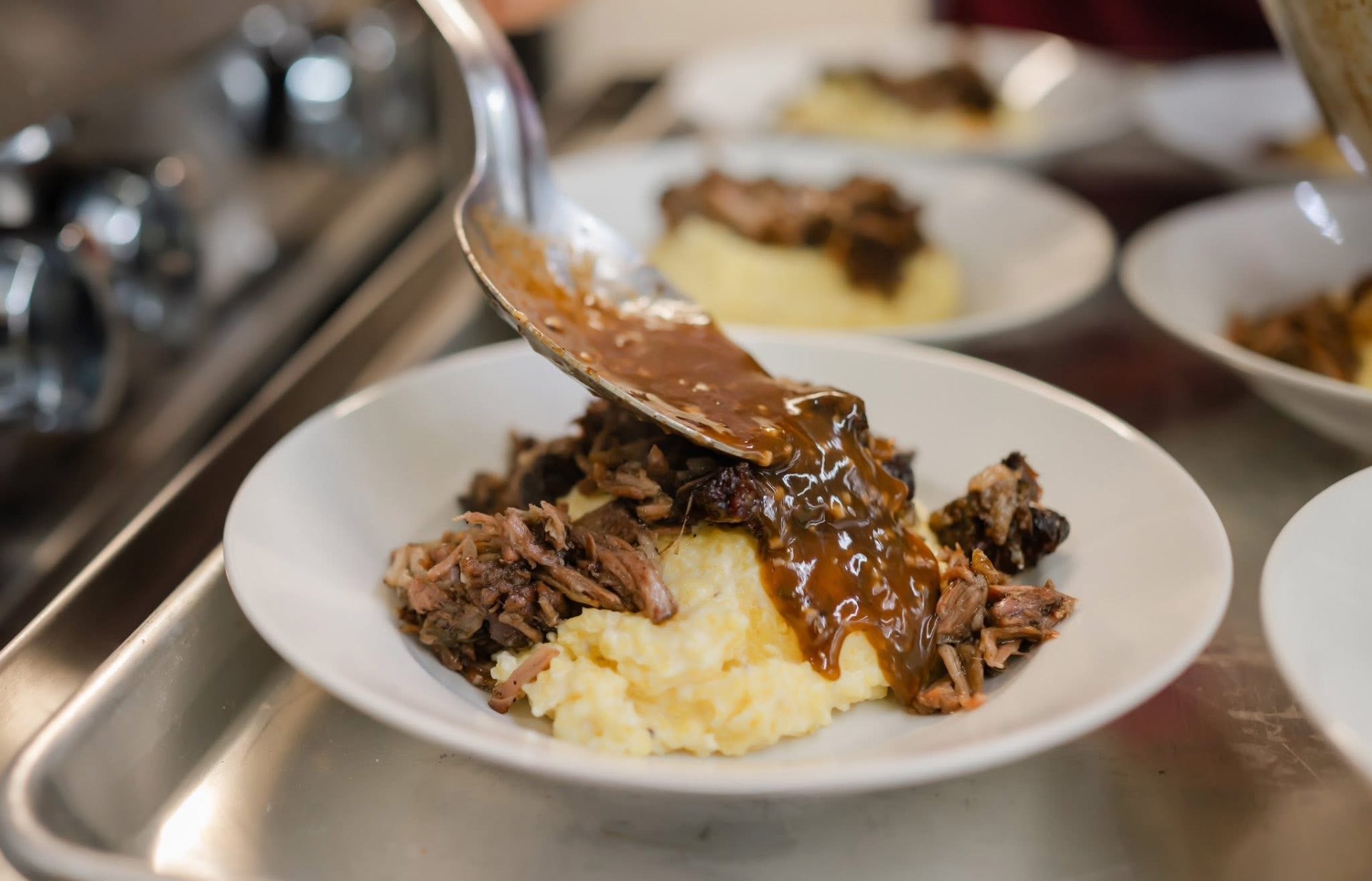 Braised brisket over grits